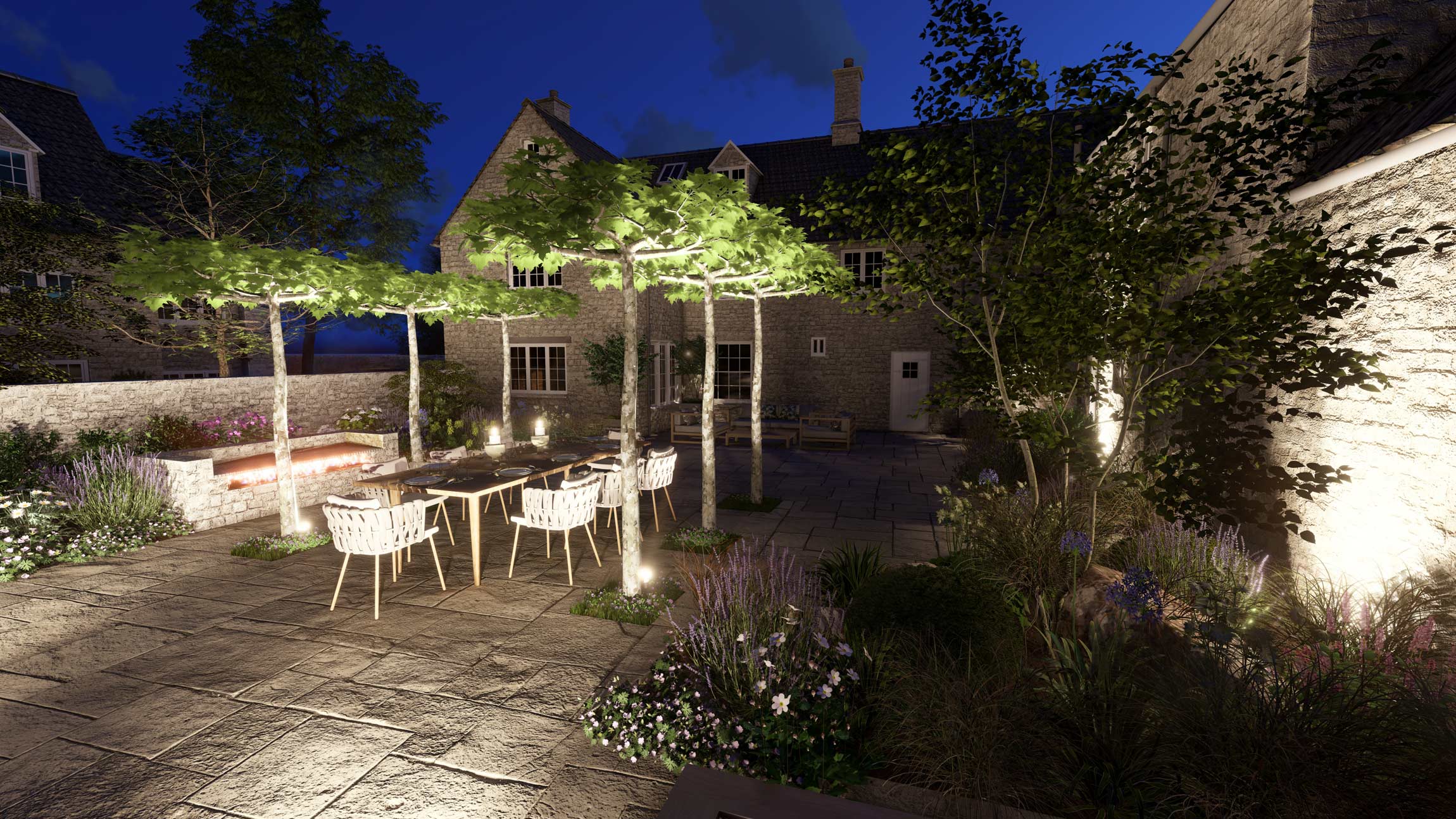 Cotswolds garden courtyard at night - Tim Miller Design